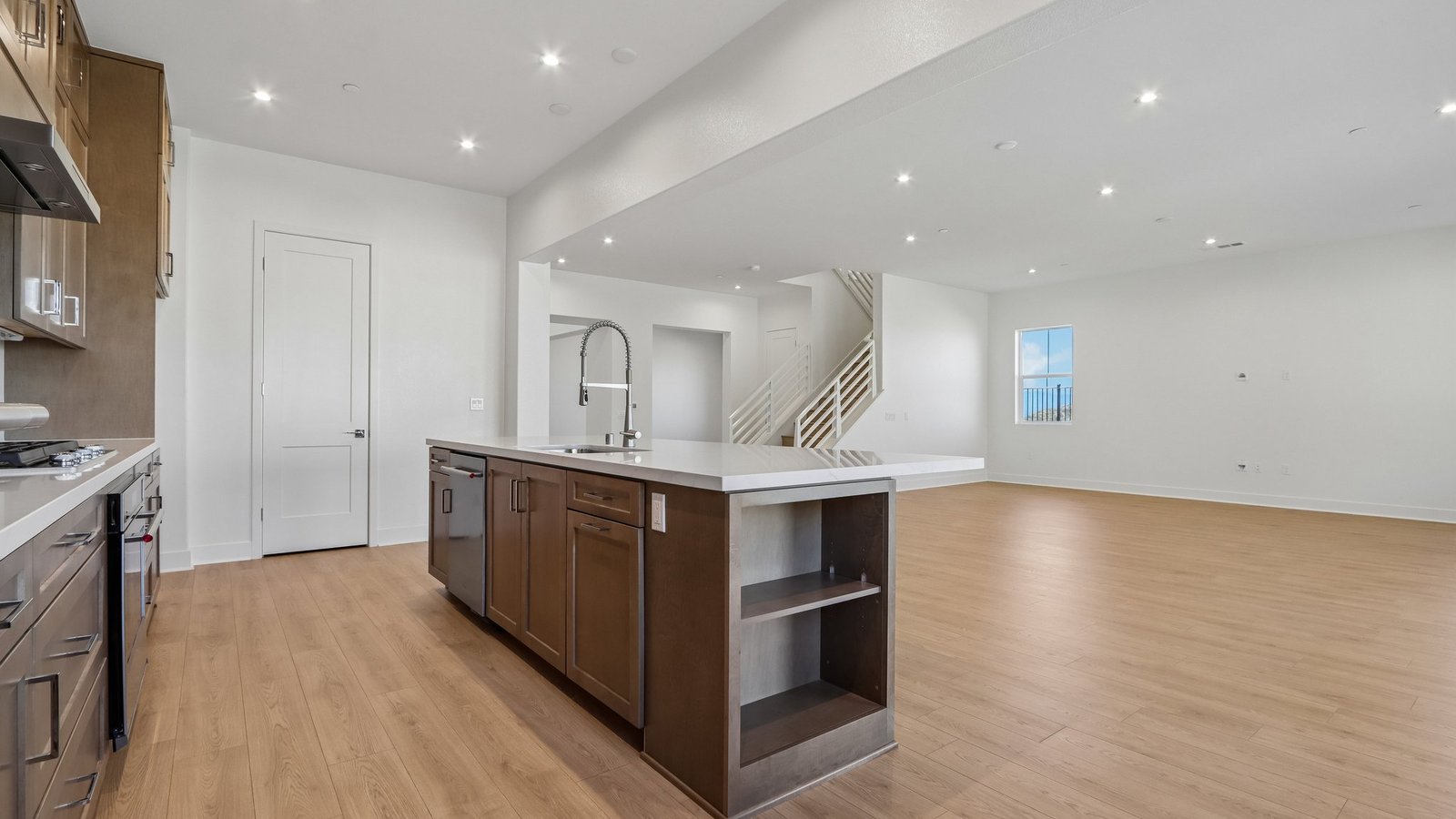 kitchen with brown cabinets and island