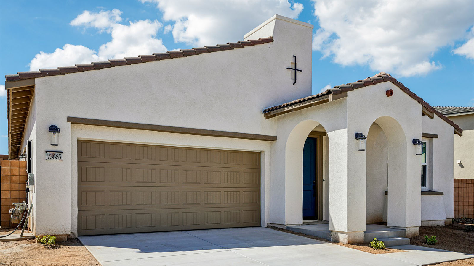 One-story Spanish Contemporary home with two-car garage
