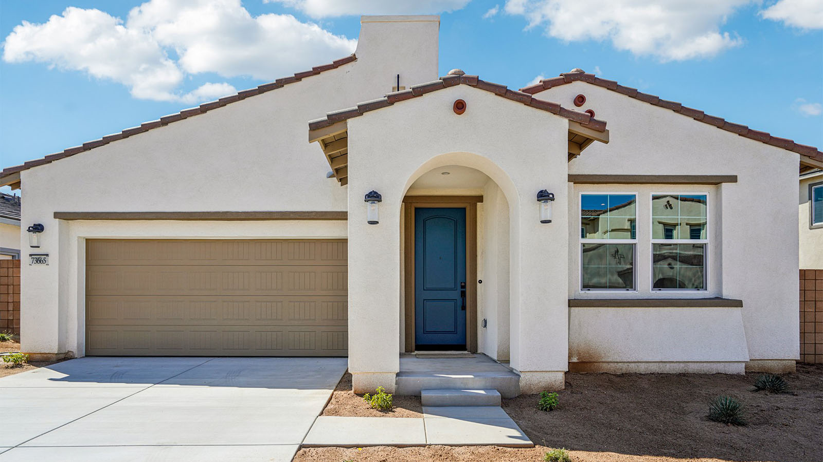 One-story Spanish Contemporary home with two-car garage