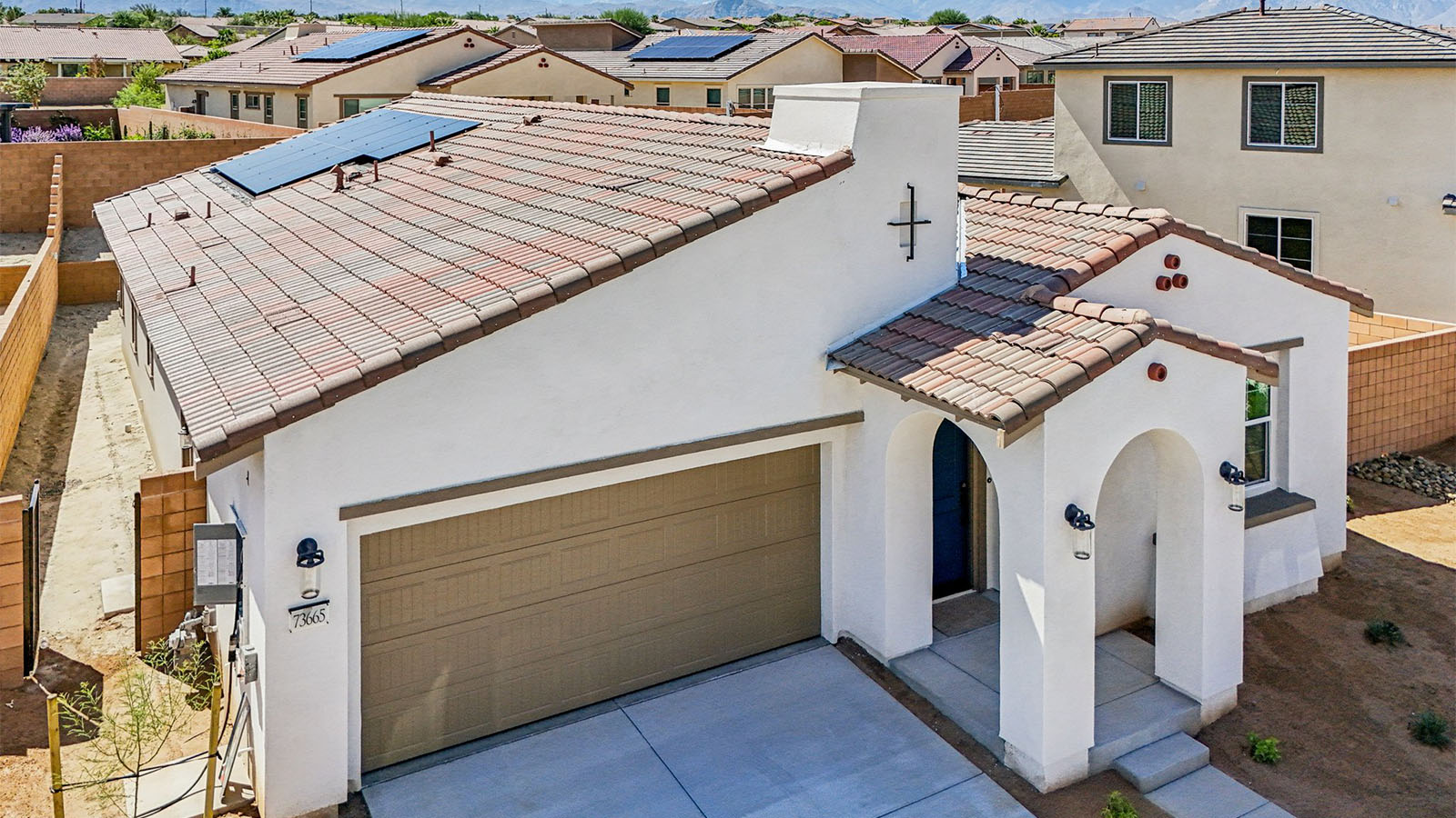 One-story Spanish Contemporary home with two-car garage