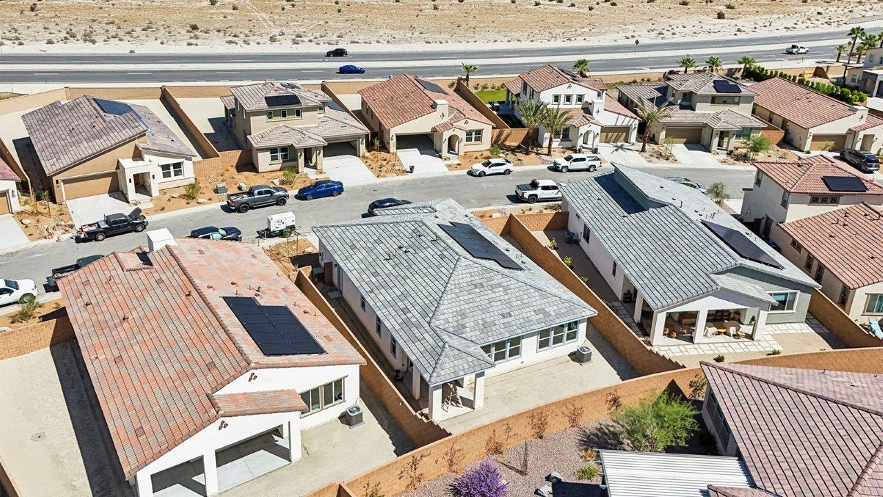 Aerial view of community and large lots
