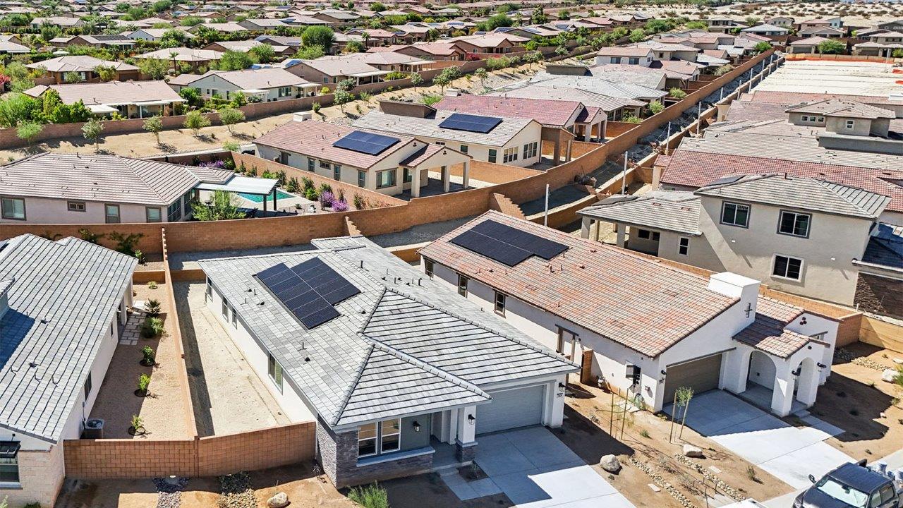 Aerial view of community and large lots