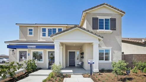 Exterior of a two-story home with a covered entryway