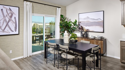 Dining area with views of the spacious backyard