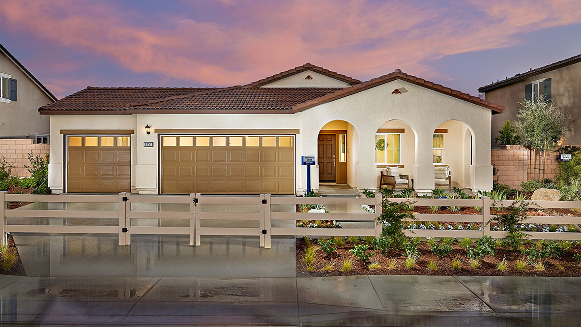 Single story home with a covered porch and 3-car garage