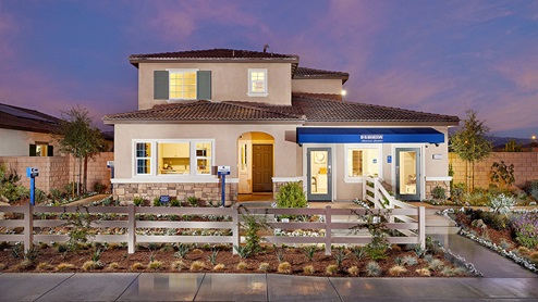 2-story home with a covered porch and 2-car garage