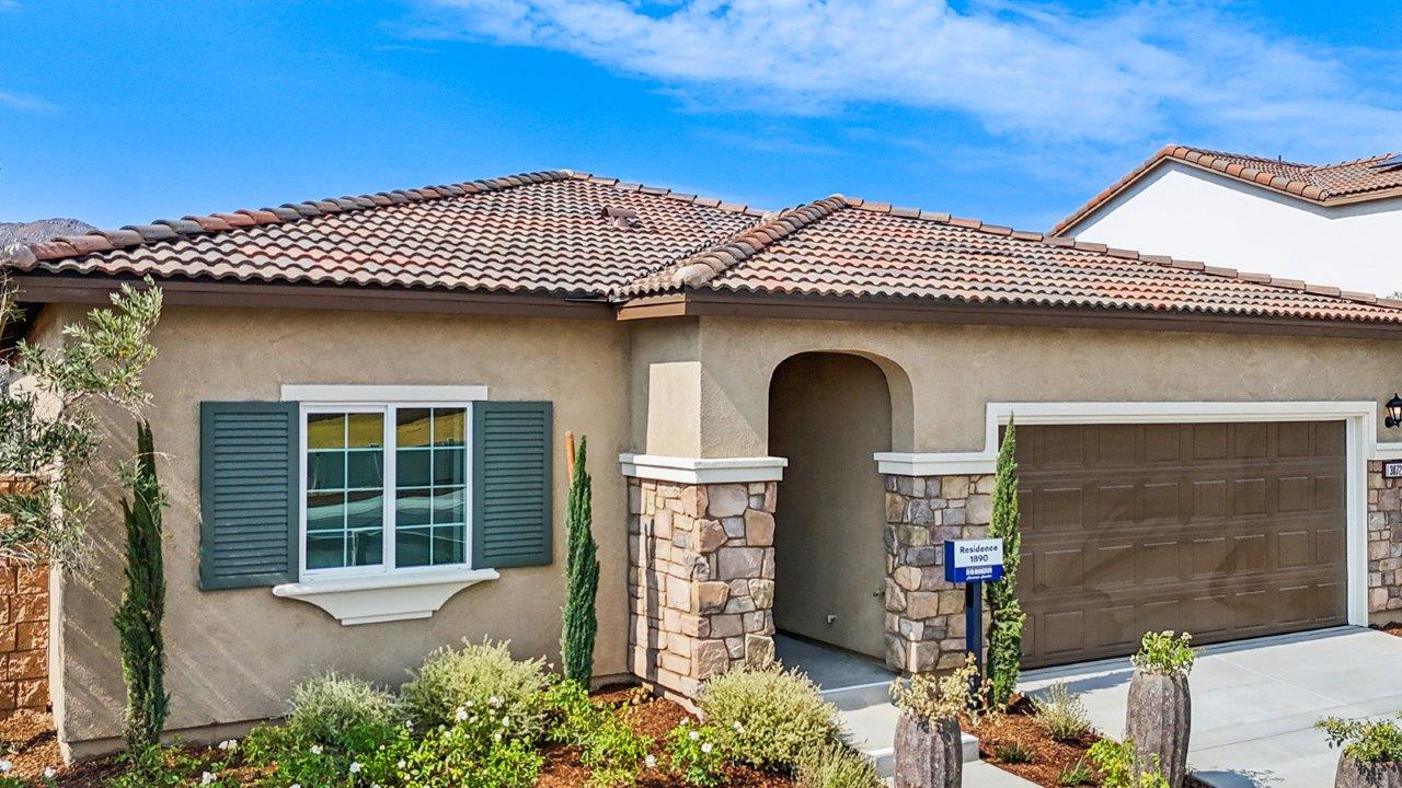 Exterior of a single story home with a covered entry