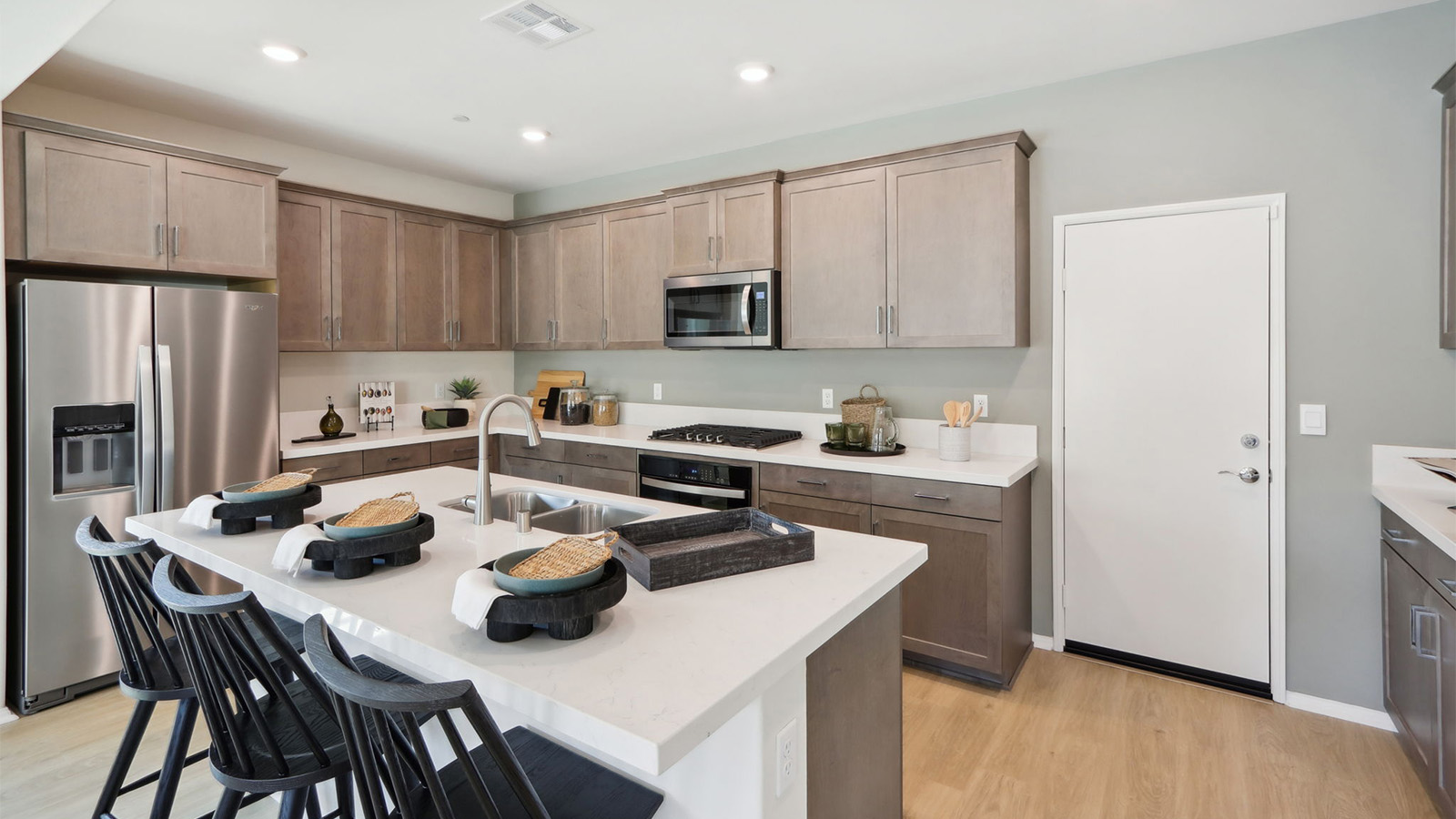 Kitchen with an island and stainless-steel appliances