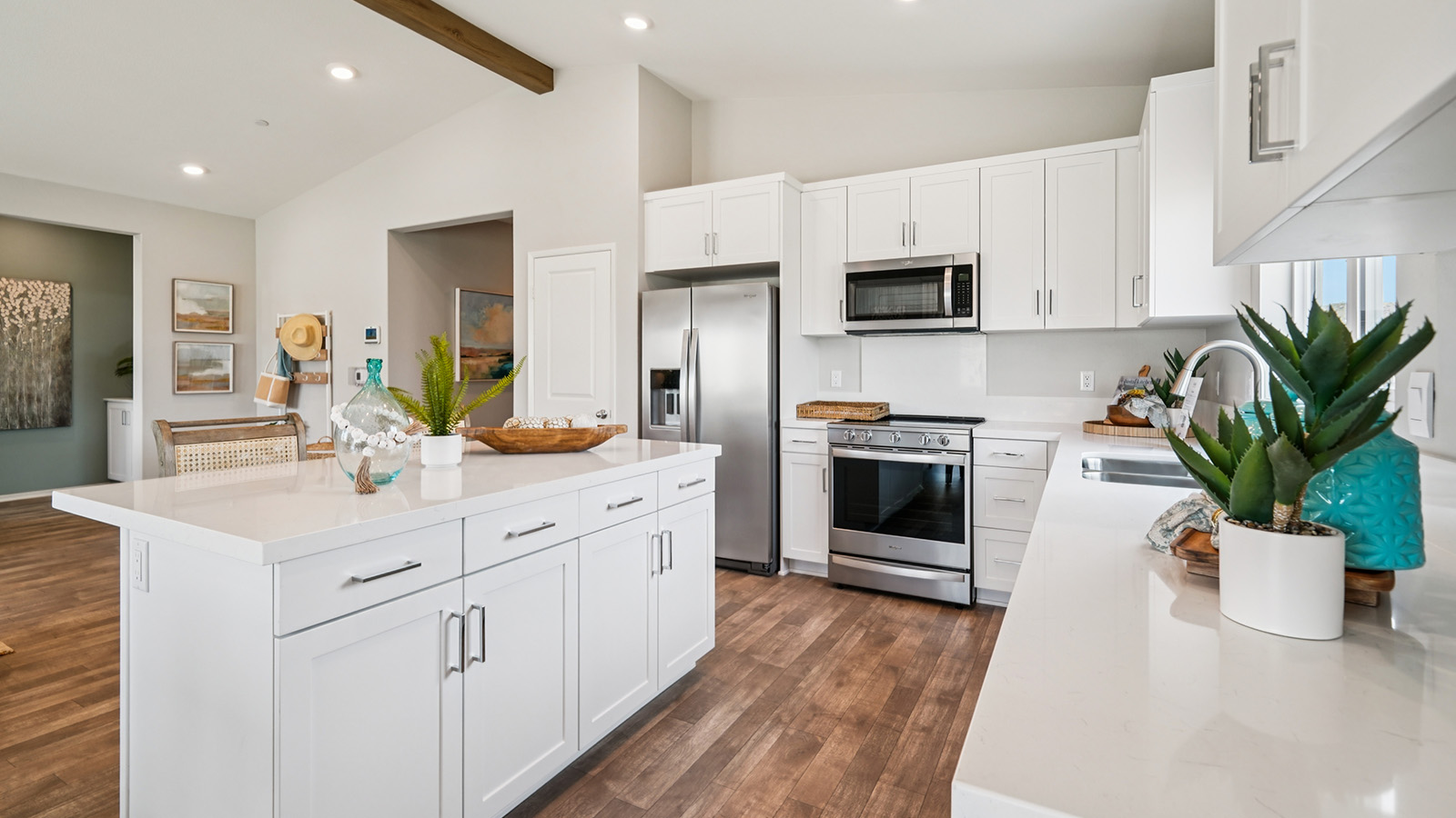 Kitchen with white cabinets and stainless steel appliances