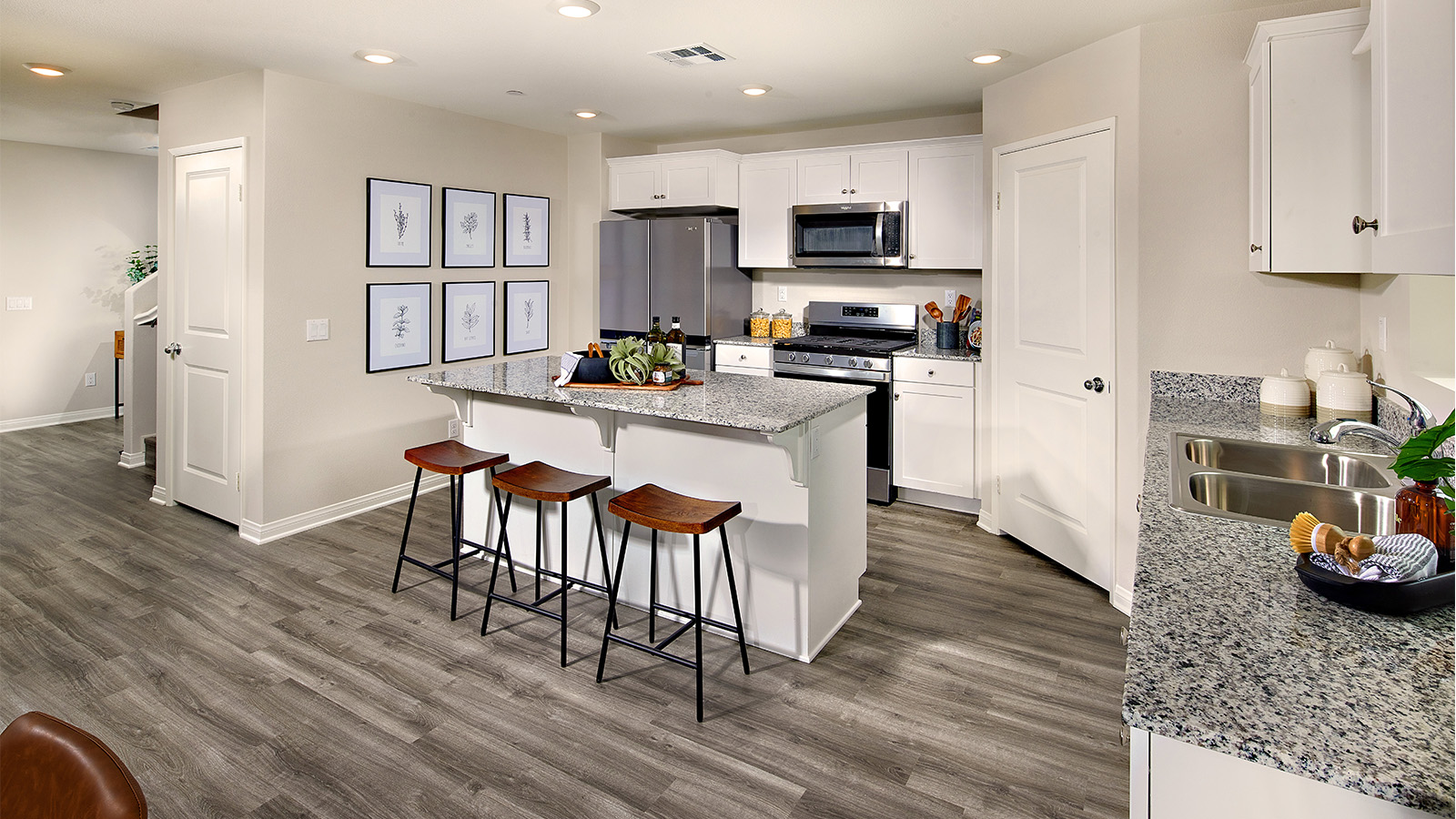 Kitchen with white cabinets and stainless-steel appliances