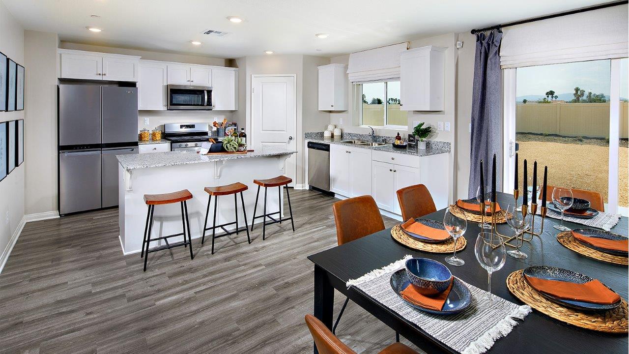 Kitchen with white cabinets and stainless-steel appliances