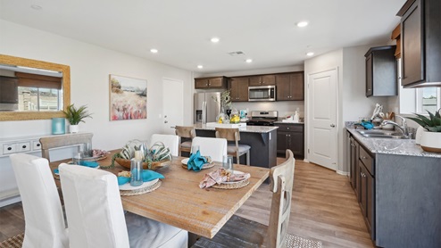 Kitchen with granite countertops and stainless-steel appliances