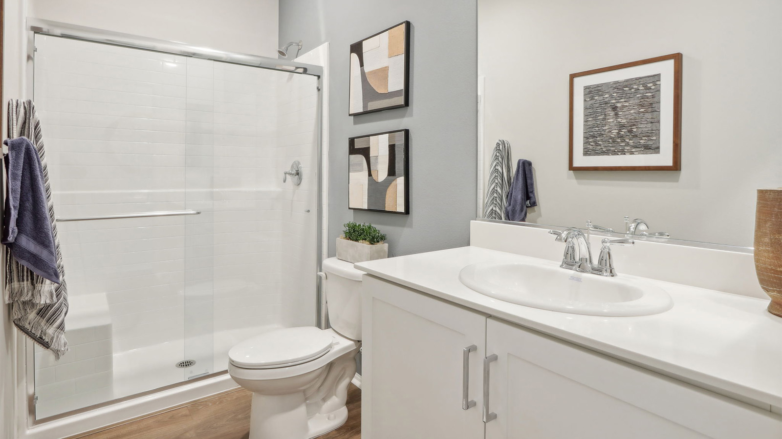 Bathroom with white cabinets