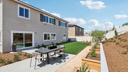 Spacious backyard with patio furniture