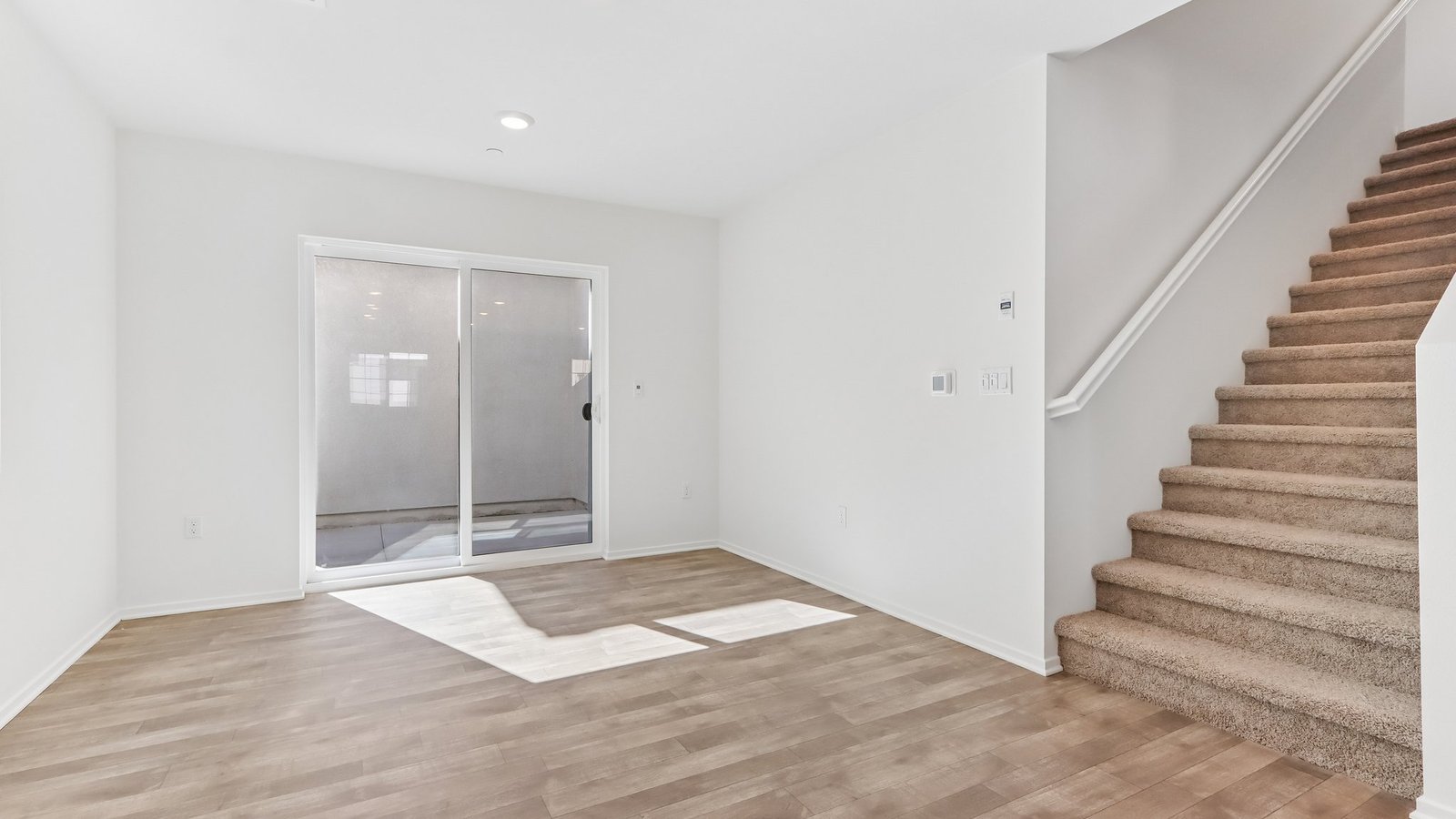 dining room with slider to outside