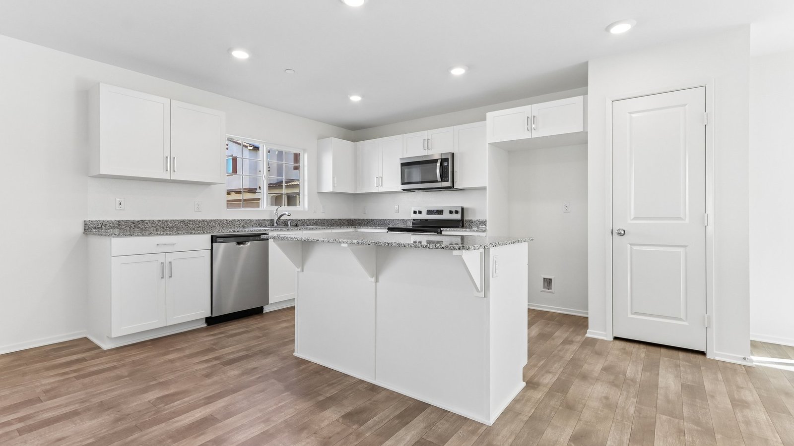 kitchen with white cabinets and stainless sleet appliances