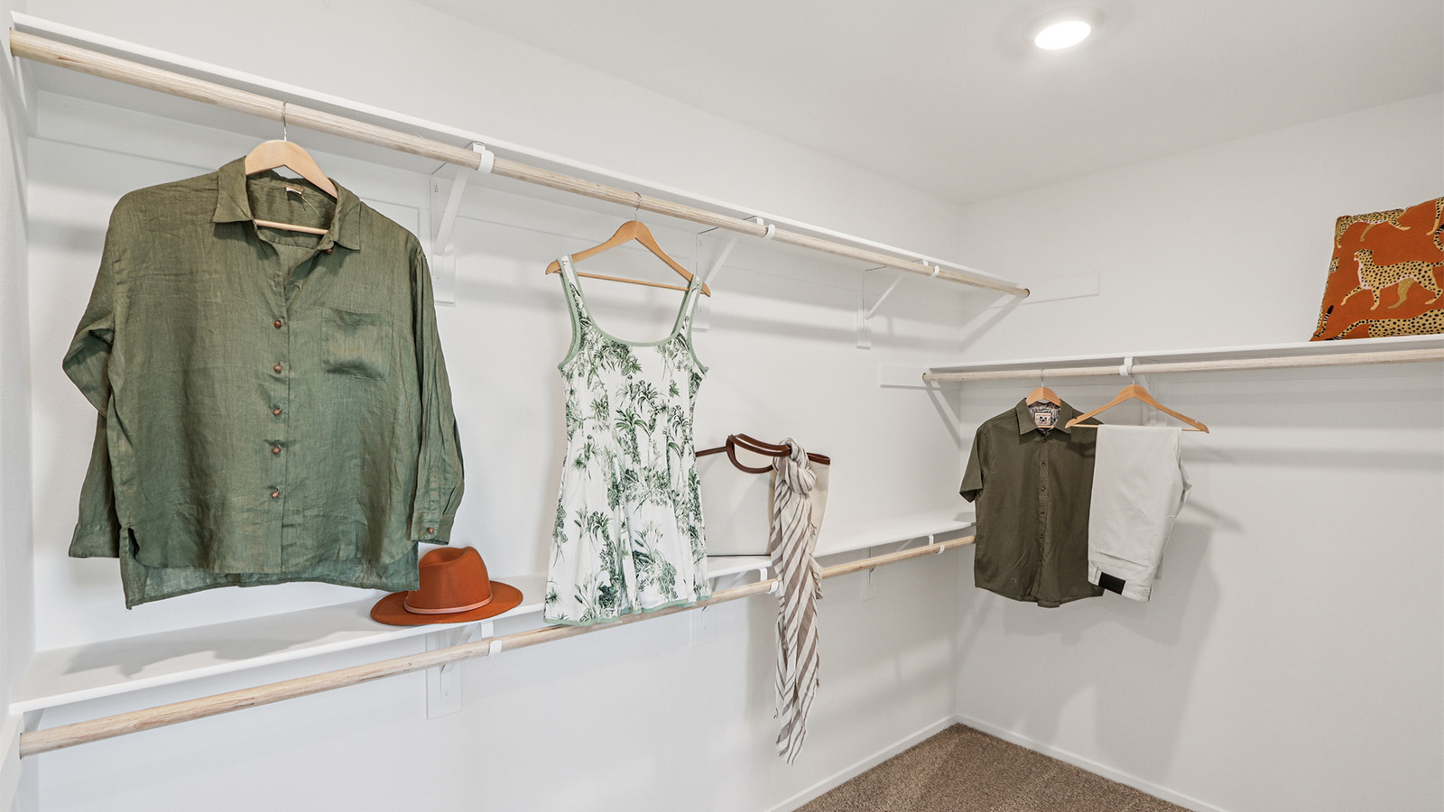Primary bedroom walk-in closet