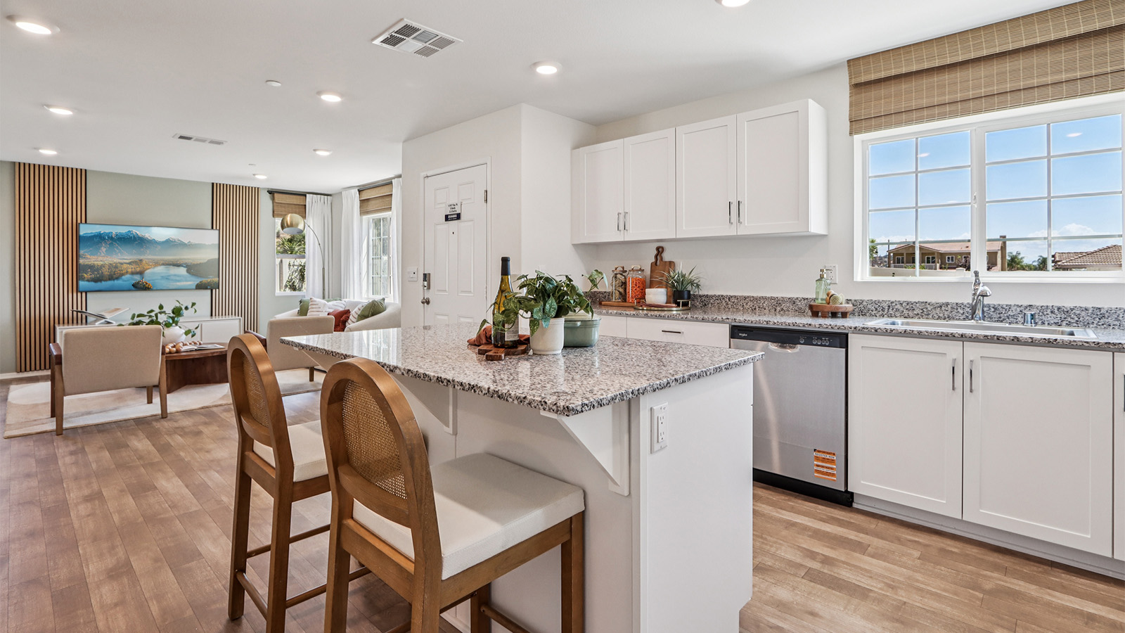 Kitchen with an island and white cabinets
