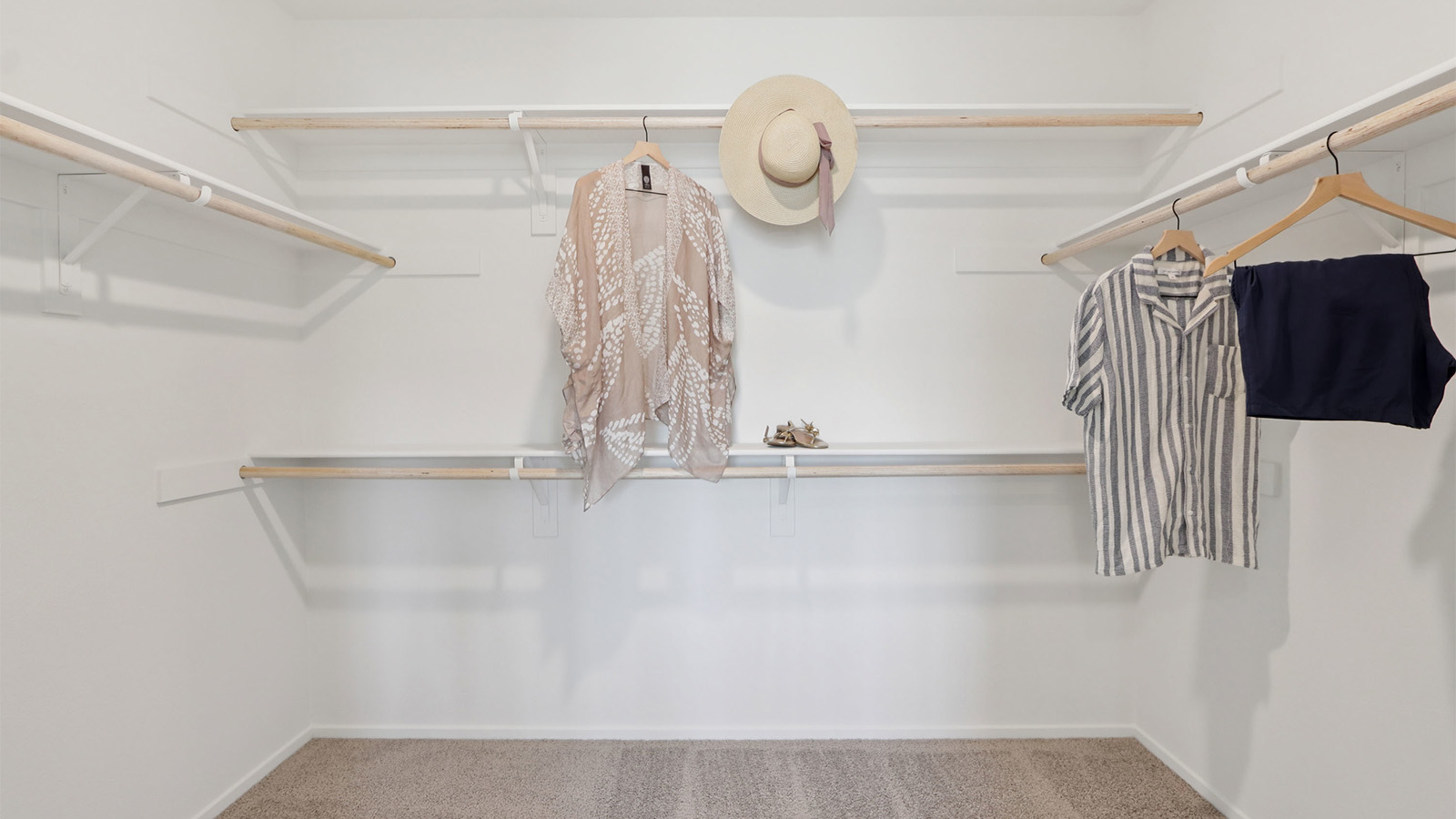 Primary bedroom walk-in closet