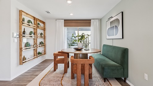 Dining space next to backyard patio