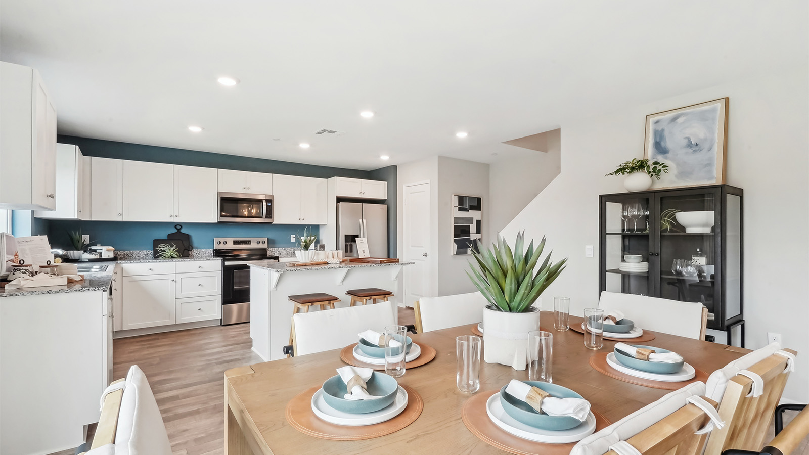 Kitchen with white cabinets and granite countertops