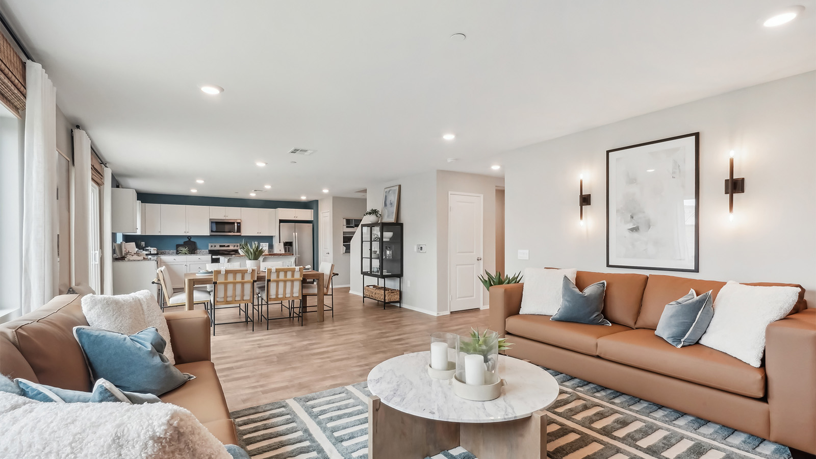 Open concept great room, dining, and kitchen