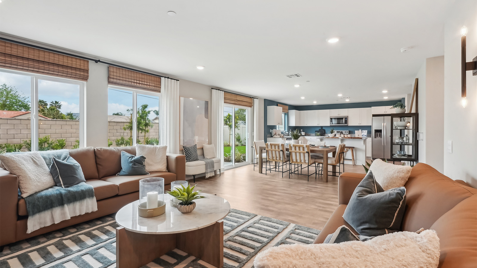 Open concept great room, dining, and kitchen