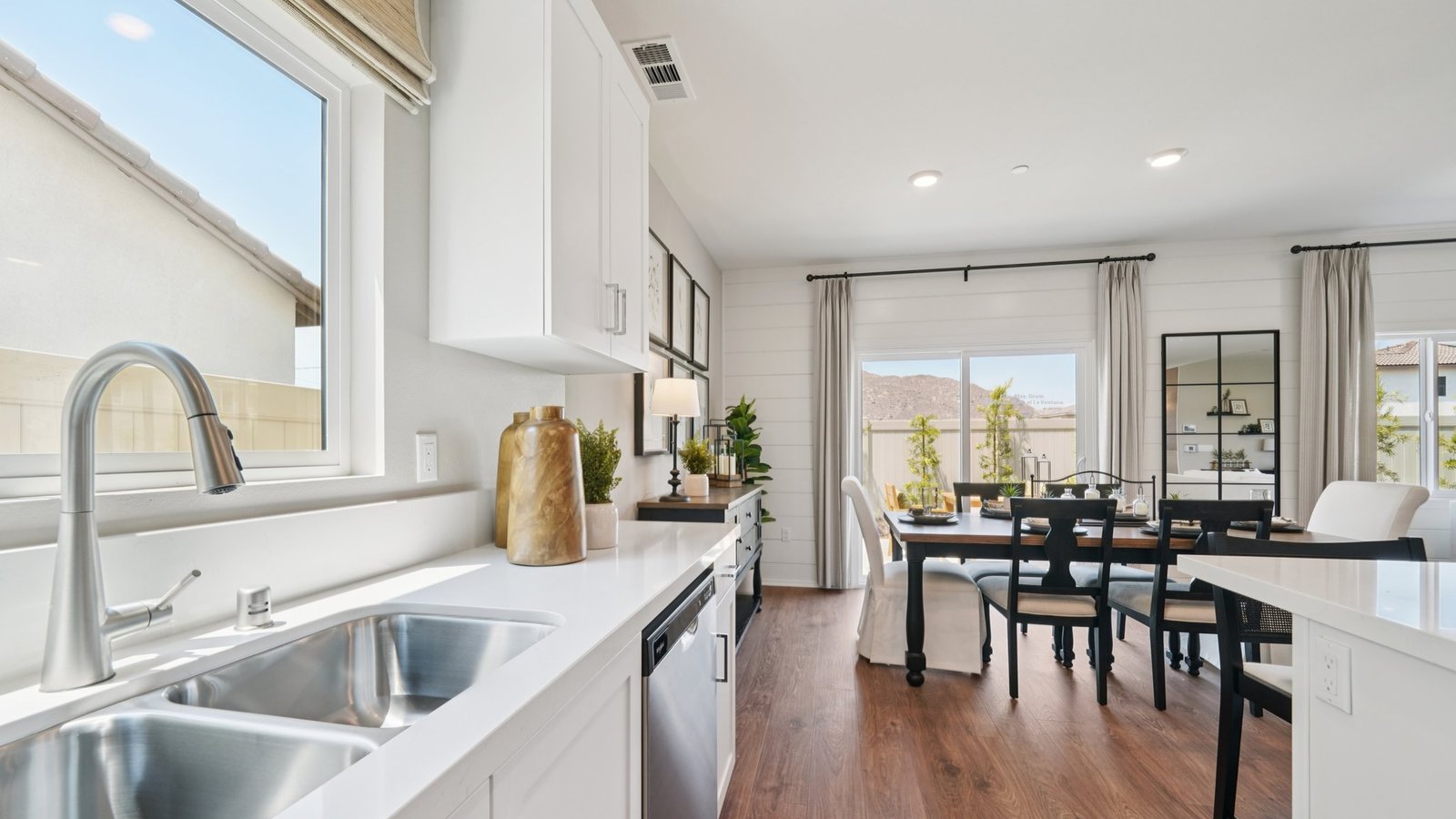 Kitchen with white cabinets and an island