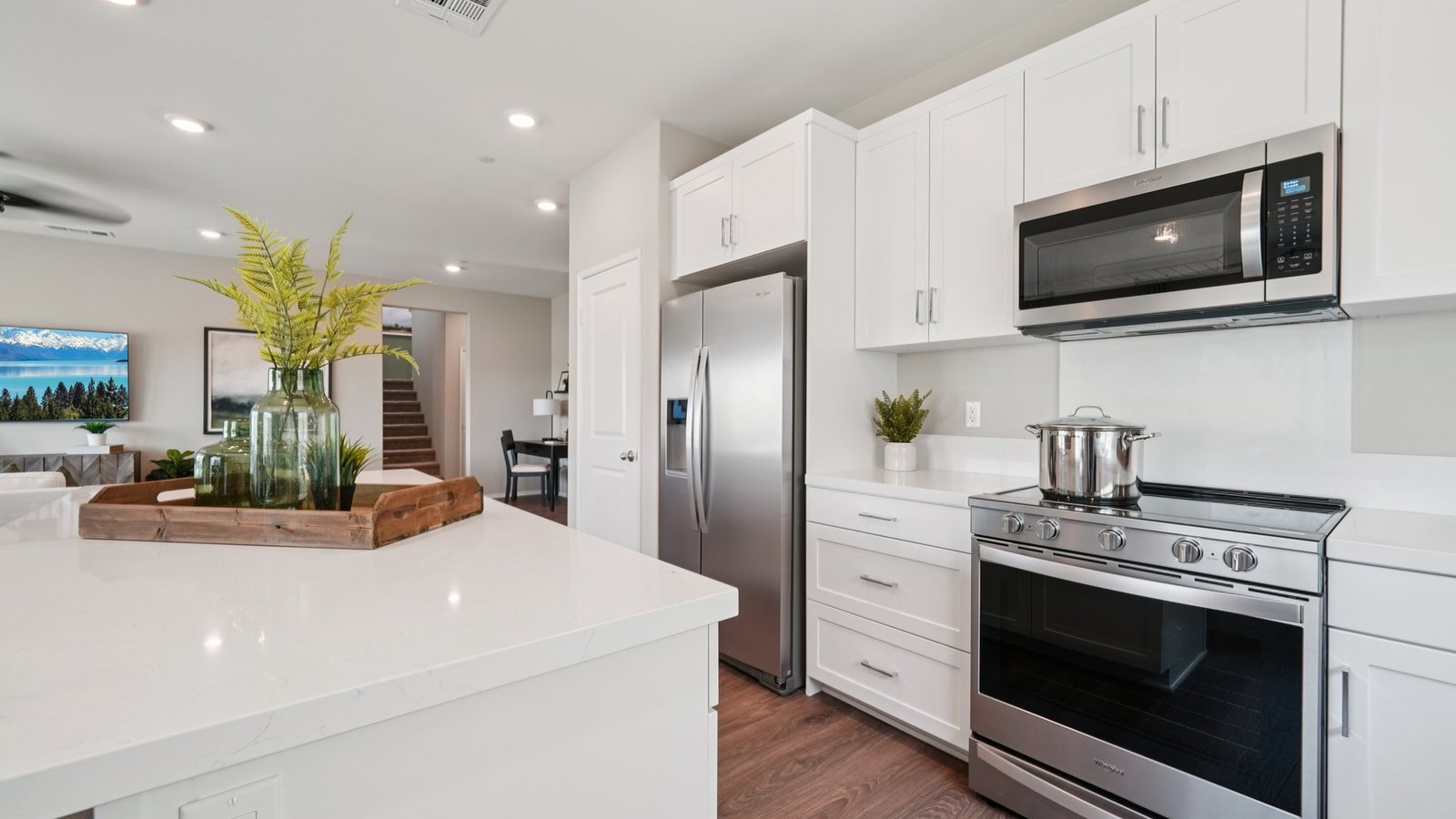 Kitchen with white cabinets and an island