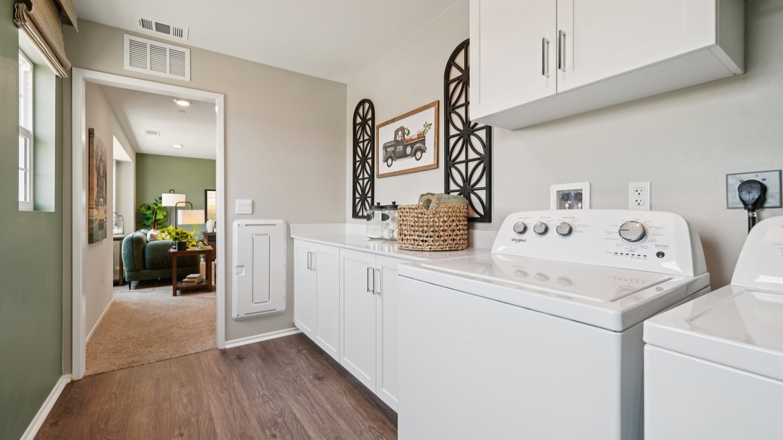 laundry room with cabinets