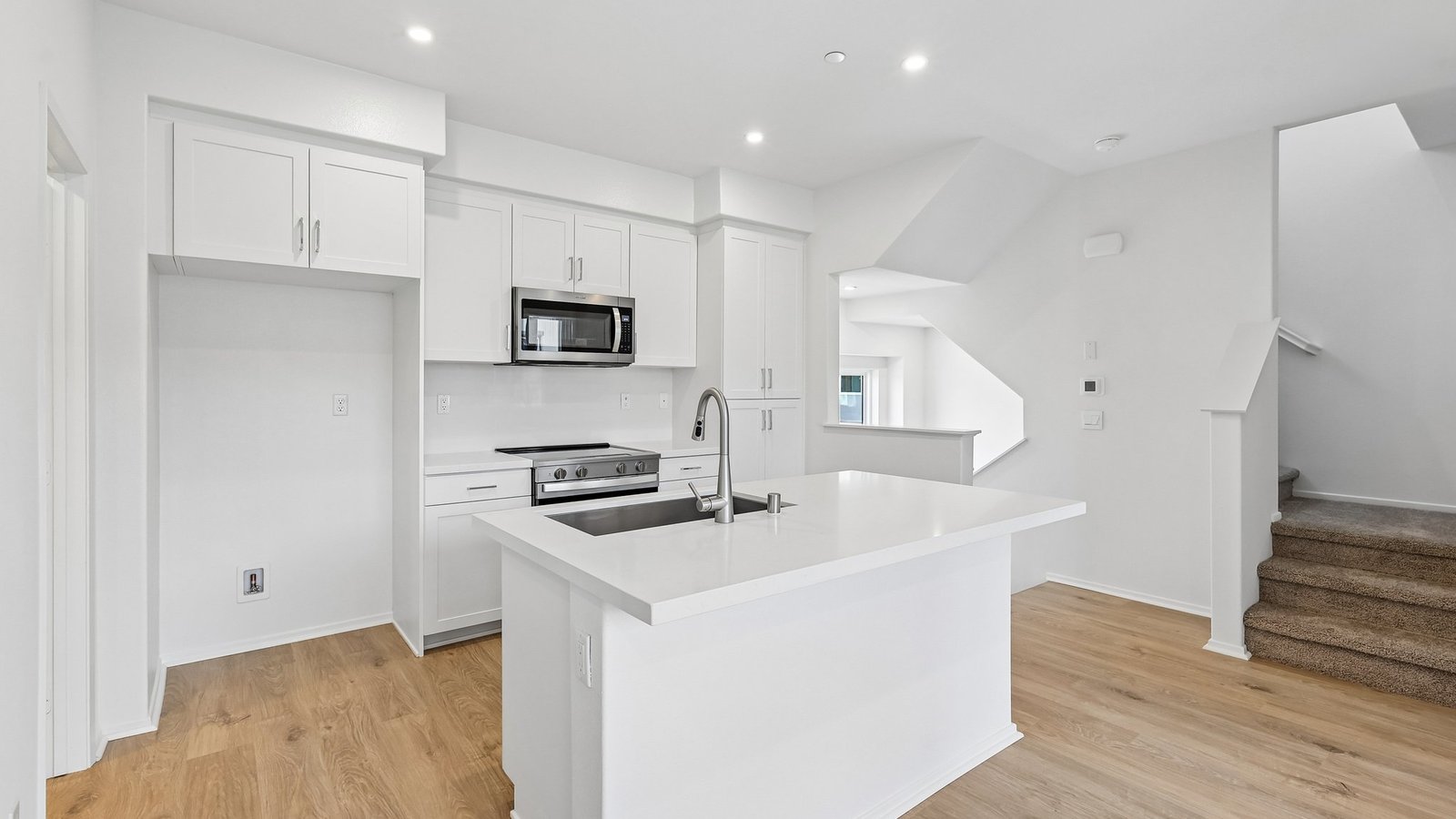 kitchen with white cabinets and stainless steel appliances