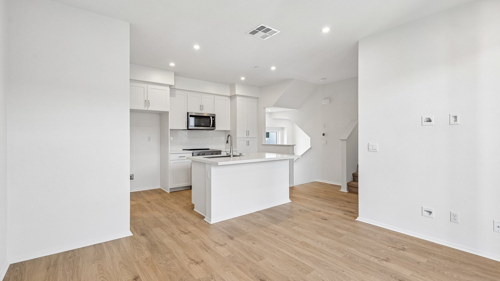 kitchen with white cabinets and stainless steel appliances
