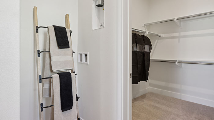Interior bathroom with walk-in closet