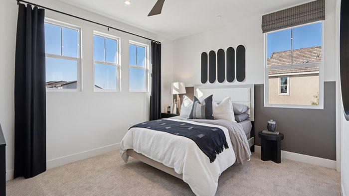 Interior bedroom with large windows