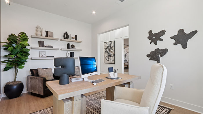Interior office with large window and accent wall