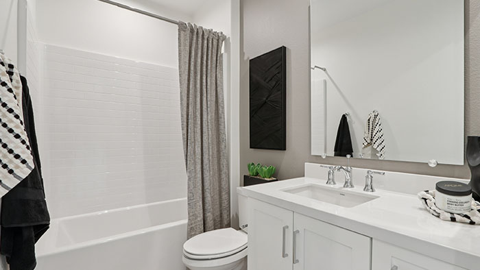 Interior bathroom with sink and full-sized shower