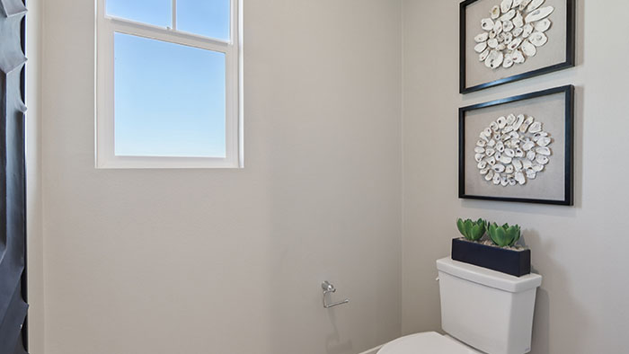 Interior half bathroom with window