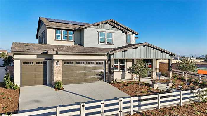 Exterior of 2-story house with 3-car garage and covered porch