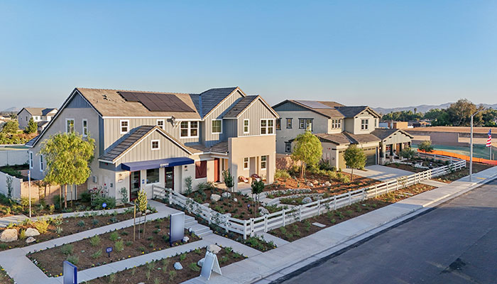 Exterior of two large homes
