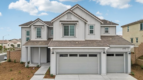 Exterior of a large 2-story home with a 3-car garage