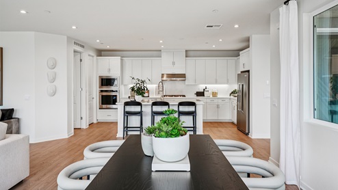 Kitchen with white cabinets and an island