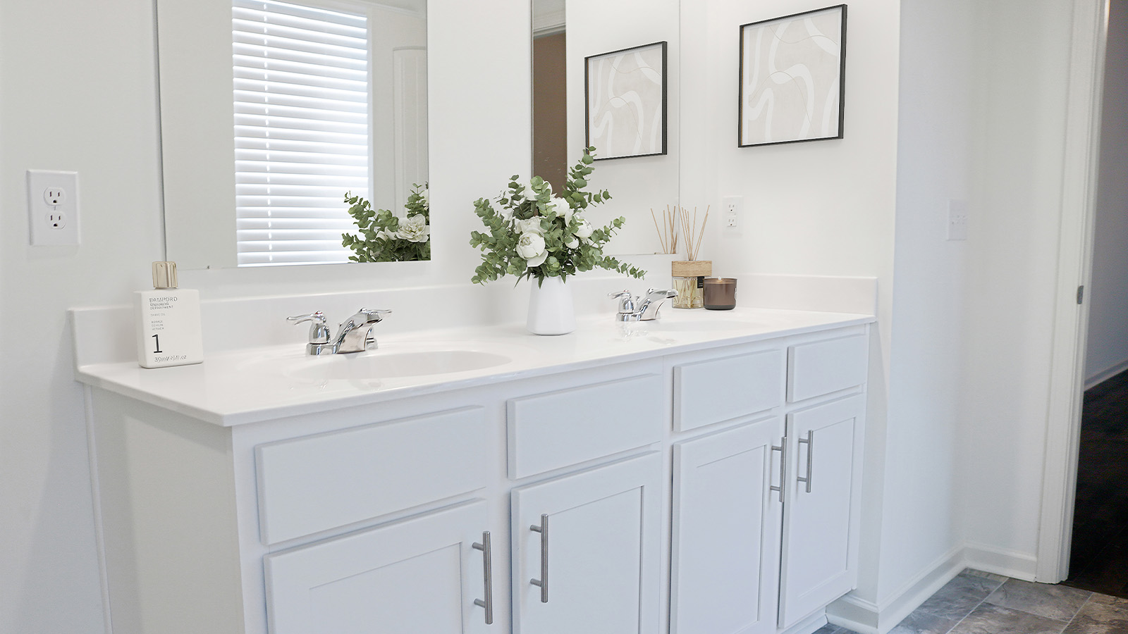 The primary bathroom has a large double vanity.
