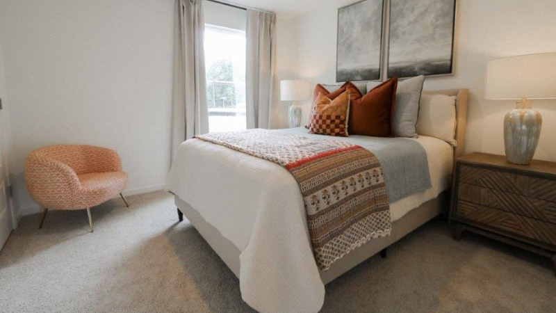 Welcome to the Carol Plan, a customer favorite of our new home communities in central, Alabama. Just over 2,500 square feet, this beautiful two- story home offers 5-bedrooms with 3-bathrooms, and a 2-car garage with a gorgeous open floor layout.   The gourmet kitchen has an oversized island for extra seating and a large pantry, and it opens to the dining area and a spacious living room. A bedroom with a full bathroom completes the main level. Bedroom One is on the second level and offers a luxurious bath with a soaking garden tub and separate shower, private bathroom, double vanities with marble counters and a large walk-in closet. There are 3 additional bedrooms, a full bathroom, a walk-in laundry room, and a loft-style living room on the second level. Quality materials and workmanship throughout, with superior attention to detail, plus a one-year builder's warranty. As a most popular favorite, this plan is ideal for any size family.    In addition, each home comes with a one-year builder's warranty to provide extra peace of mind. It's worth noting that our smart home technology package is also part of the deal. The included Smart Home Technology Package is designed for easy use and offers unparalleled convenience, enabling you to effortlessly control various key features with just a simple touch. Some of the highlighted conveniences of this package comprise lighting automation, an IQ panel, a video doorbell, keyless front door entry, and the ability to manage the temperature from the comfort of your phone. Call to schedule your personal guided tour of the Carol today!