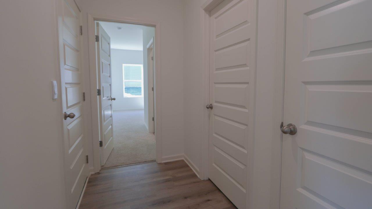 Welcome to the Madison, a new floor plan designed with comfort and convenience in mind. Just under 2,000 square feet, this beautiful single- story home offers 4-bedrooms with 3-bathrooms, and a 3-car garage, with a unique open floor plan designed for comfort and luxury.      As you enter the home, you are met with an inviting foyer with storage, a full guest bathroom, and a hall leading to the 2nd and 3rd secondary bedrooms. Further down the hall, on the opposite wall, provides access to the 2-car garage, storage, and your laundry room. Privately tucked away in this area is also the additional 4th bedroom, ideal for guest stays or a private office. Each bedroom is a generous size with a spacious closet.      As you continue to the end of the hall, you will find the stunning open layout of the living area and beautiful kitchen. The kitchen includes granite countertops, stainless steel appliances, stylish shaker cabinetry, and a center island perfect for additional seating. With natural light and nearby covered patio access, the living and dining area are integrated perfectly to complete this relaxing atmosphere, with access to a back covered porch area for you to enjoy.     The primary bedroom is tucked away off the living area. As natural light fills the room, this suite feels like a dreamlike retreat. The spa-like ensuite bath includes a separate garden tub, relaxing shower, double vanity sink, and large walk-in closet. Designed with elegant yet modern living in mind, the easy-to-use Smart Home Technology Package included in every home provides the ultimate convenience, allowing you to control key features with the touch of a button. Featured conveniences include lighting automation, IQ panel, video doorbell, keyless front door entry, and temperature control from the ease of your phone.  So, what are you waiting for? Come make the Madison your new home today!