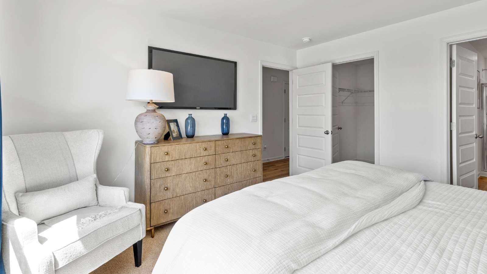 Another angle of the spacious primary suite.