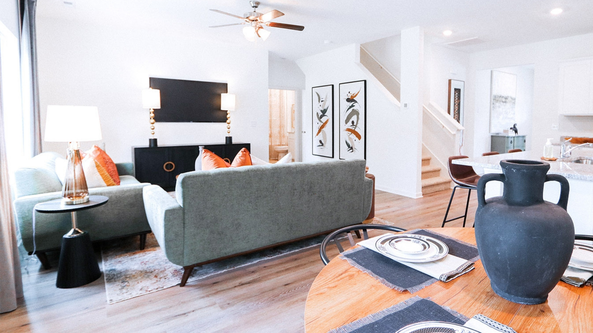 The kitchen area blends seamlessly into the living and dining areas, allowing for the whole family to spend time together.