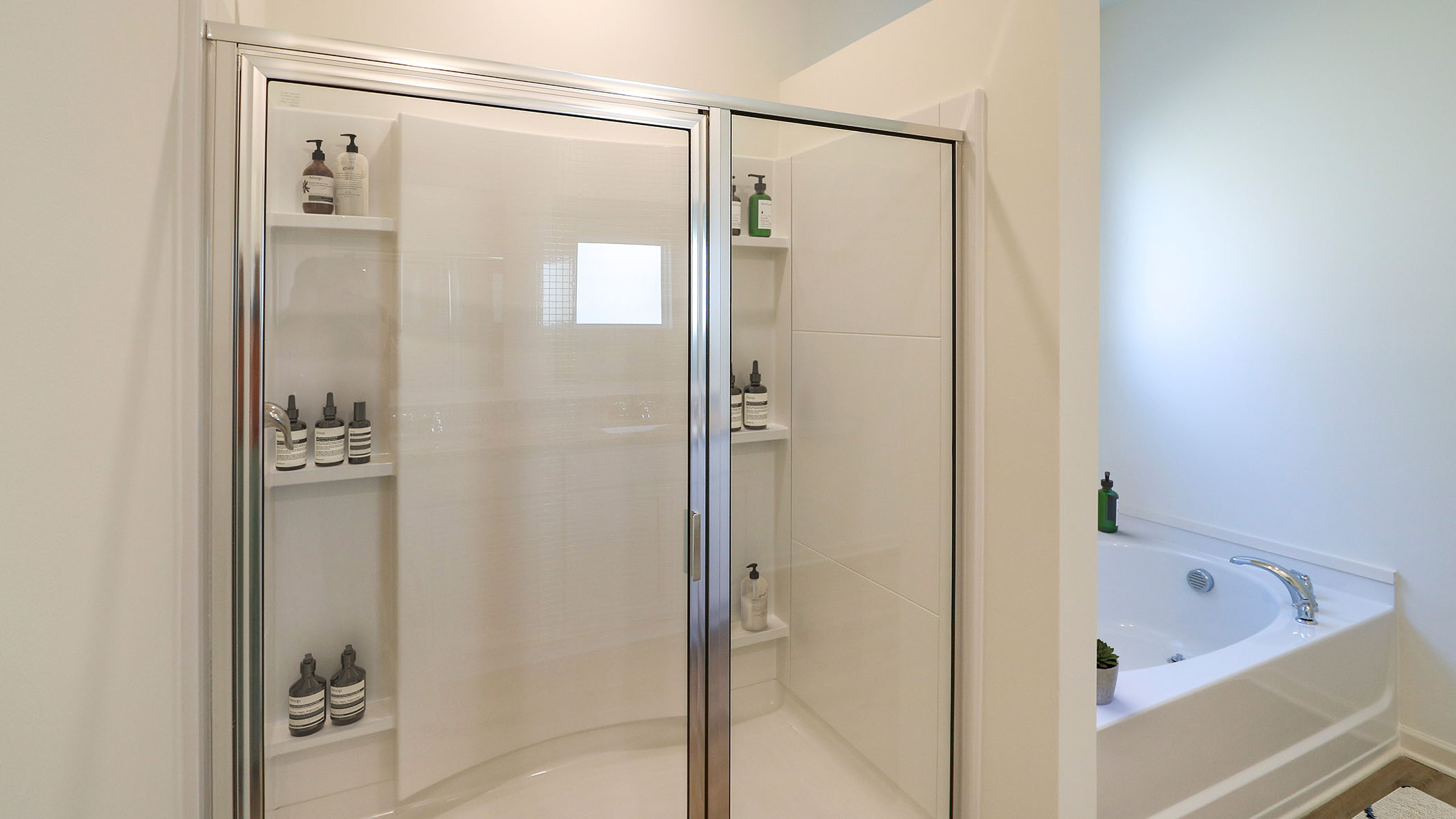 The bathroom has a standup shower.