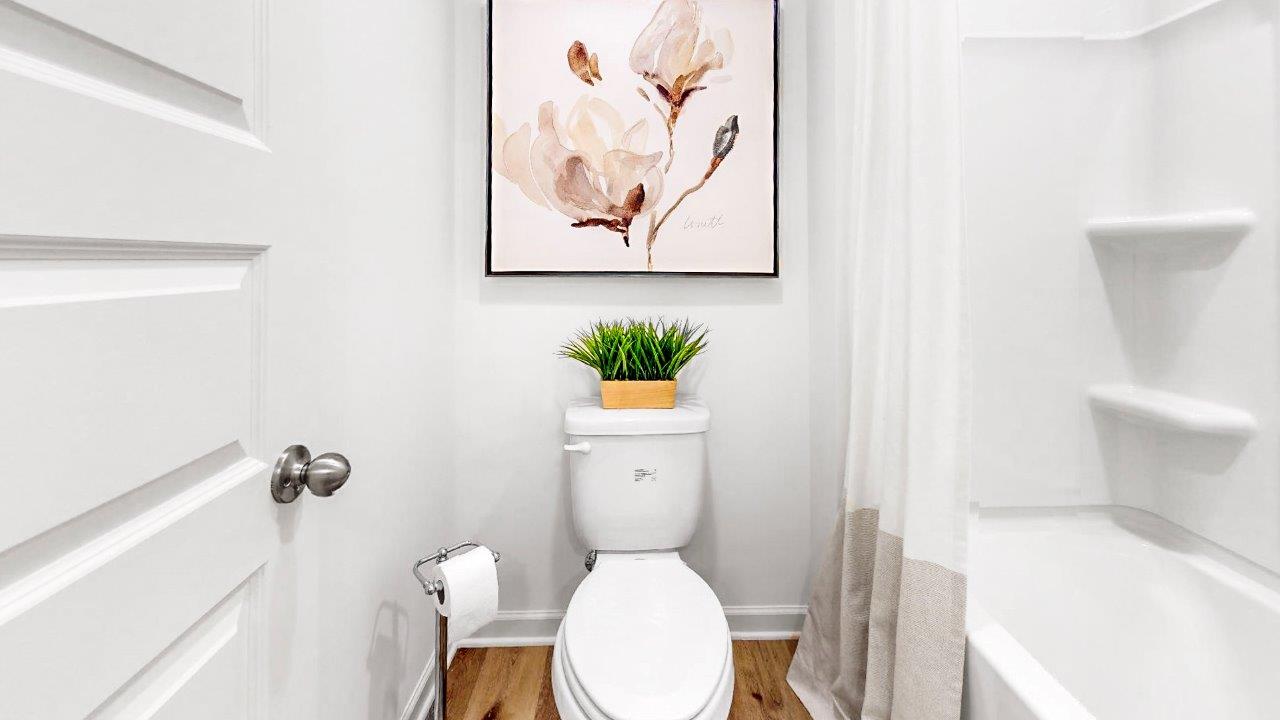 there is an additional full bathroom upstairs complete with double vanity, toilet and tub shower