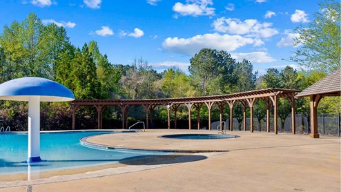 Welcome to Doss Ferry by D.R. Horton, in Kimberly, Alabama. Ideally located in northeast Jefferson County minutes from I-65. This new home community provides easy access to Hayden, Mount Olive, Gardendale’s conveniences, nearby Fultondale dining options, and excellent recreation spots throughout the area. Go Mortimer Jordan Blue Devils! With home plans ranging in size from 1,618 square feet up to 2,511 square feet, Doss Ferry offers a variety of home plans including one level open floor plans to a spacious two story. Each home in Doss Ferry is uniquely designed with modern living in mind, featuring granite countertops, elegant and durable flooring, and stainless-steel appliances. The easy-to-use Smart Home Technology Package included in every home provides the ultimate convenience, allowing you to control key features with the touch of a button. Featured conveniences include lighting automation, IQ panel, video doorbell, keyless front door entry, and temperature control from the ease of your phone. Doss Ferry is a unique living experience. Our community offers a spacious community pool, residents club, meandering walking trails with room to explore. Whether you are looking for a spacious open floor plan or a more intimate design, Doss Ferry has a variety of options to suit your individual needs. Doss Ferry’s location is perfect for accessing spots for hiking and biking adventures. In addition, state-of-the-art local parks and recreational opportunities are just minutes away, offering something for everyone. Take a personal tour of Doss Ferry today and discover how this beautiful new home community near Kimberly, Alabama, can perfectly match your lifestyle.