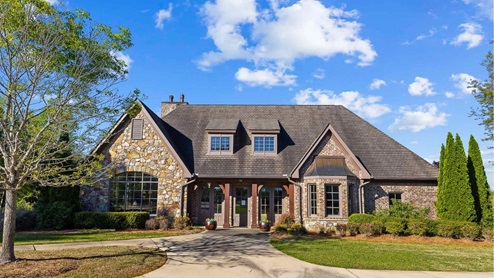 Welcome to Doss Ferry by D.R. Horton, in Kimberly, Alabama. Ideally located in northeast Jefferson County minutes from I-65. This new home community provides easy access to Hayden, Mount Olive, Gardendale’s conveniences, nearby Fultondale dining options, and excellent recreation spots throughout the area. Go Mortimer Jordan Blue Devils! With home plans ranging in size from 1,618 square feet up to 2,511 square feet, Doss Ferry offers a variety of home plans including one level open floor plans to a spacious two story. Each home in Doss Ferry is uniquely designed with modern living in mind, featuring granite countertops, elegant and durable flooring, and stainless-steel appliances. The easy-to-use Smart Home Technology Package included in every home provides the ultimate convenience, allowing you to control key features with the touch of a button. Featured conveniences include lighting automation, IQ panel, video doorbell, keyless front door entry, and temperature control from the ease of your phone. Doss Ferry is a unique living experience. Our community offers a spacious community pool, residents club, meandering walking trails with room to explore. Whether you are looking for a spacious open floor plan or a more intimate design, Doss Ferry has a variety of options to suit your individual needs. Doss Ferry’s location is perfect for accessing spots for hiking and biking adventures. In addition, state-of-the-art local parks and recreational opportunities are just minutes away, offering something for everyone. Take a personal tour of Doss Ferry today and discover how this beautiful new home community near Kimberly, Alabama, can perfectly match your lifestyle.